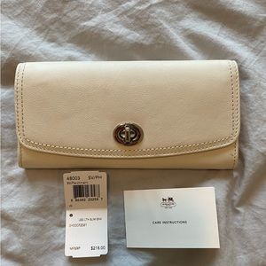 White Coach wallet. New with tags.
